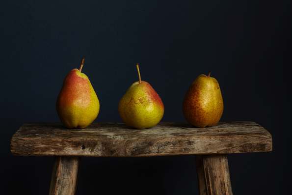 3 pears on timber stool