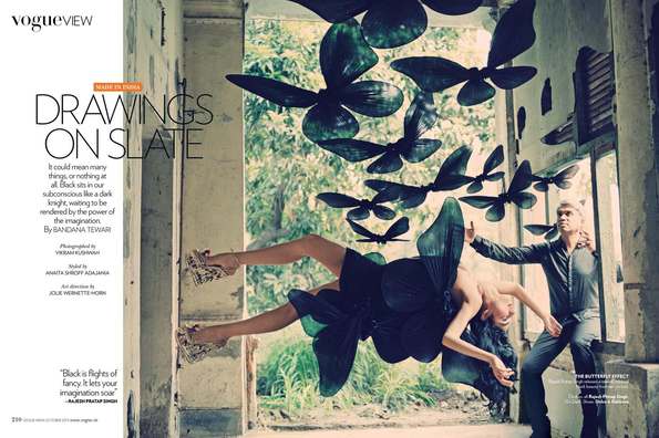 woman levitating, giant black butterflies flying