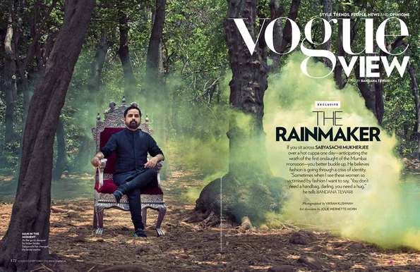 portrait of man in forest with colourful smoke